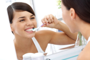 girl brushing her teeth Dental Care Center
