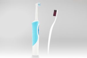 Power vs standard toothbrush Dental Care Center