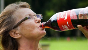 Woman Drinking Soda Dental Care Center