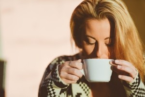 woman drinking coffee Dental Care Center