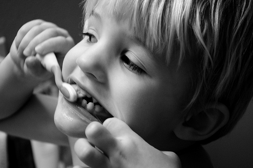 kid brushing teeth Dental Care Center