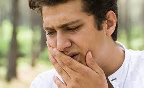 boy with mouth pain